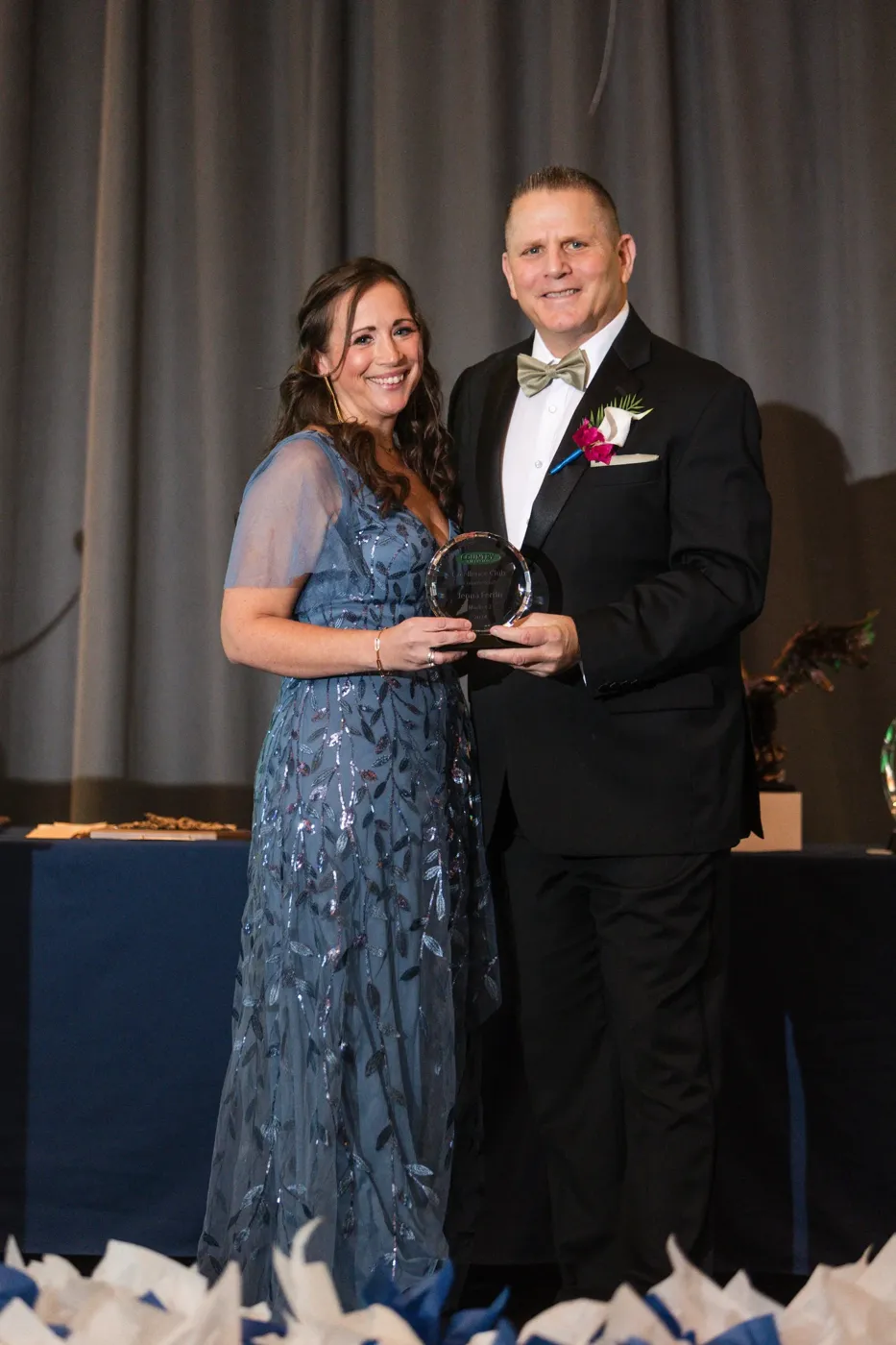 Award presentation at a corporate recognition banquet