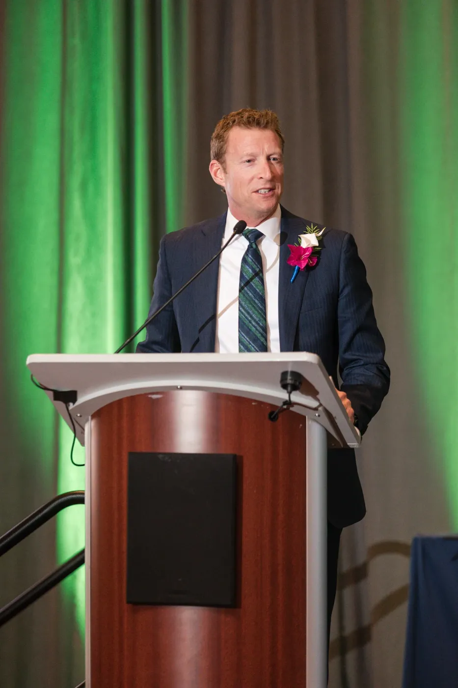 Speaker at a podium during a banquet
